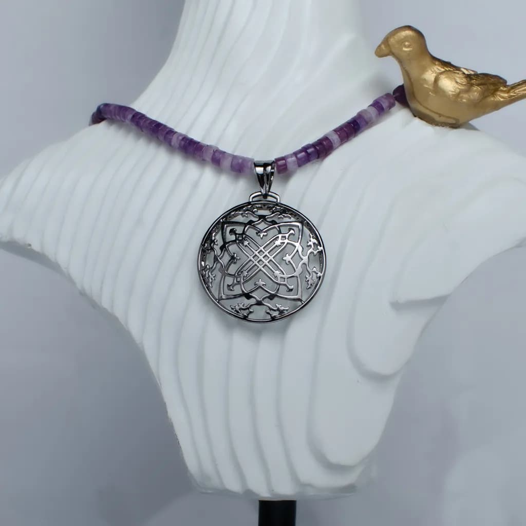 DISCOID SILVER PENDANT
