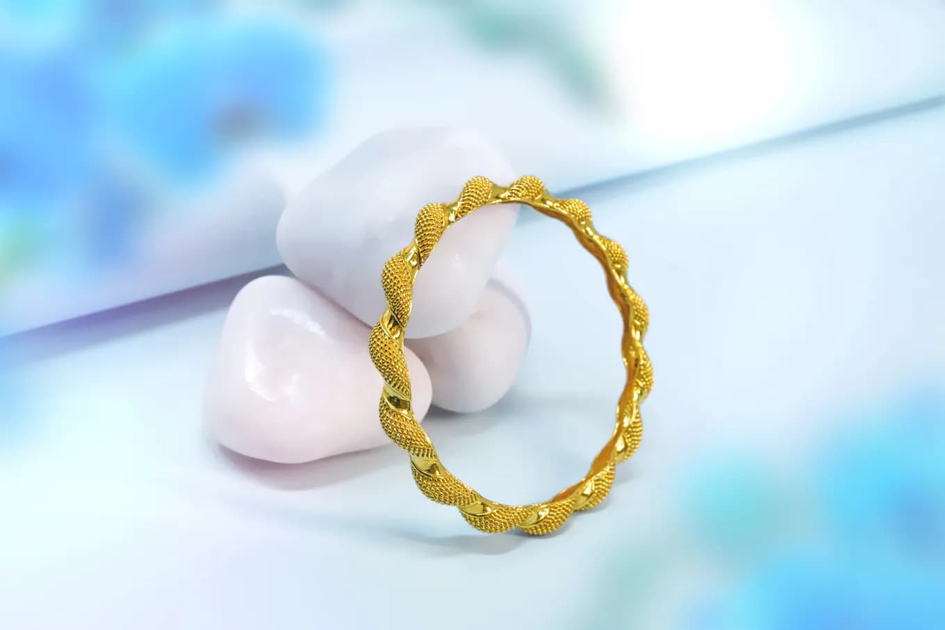 TWISTED GOLD BANGLE