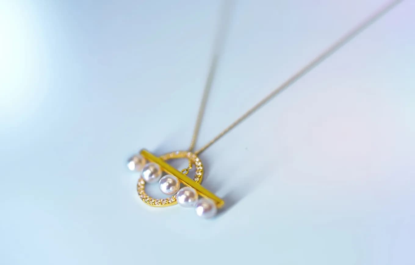 PEARL CASCADE GOLD PENDANT