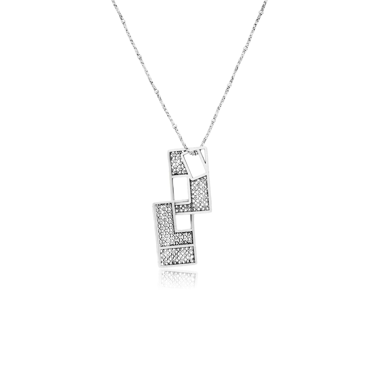 QUIRKY SILVER PENDANT